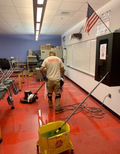 Cleaner in a school classroom